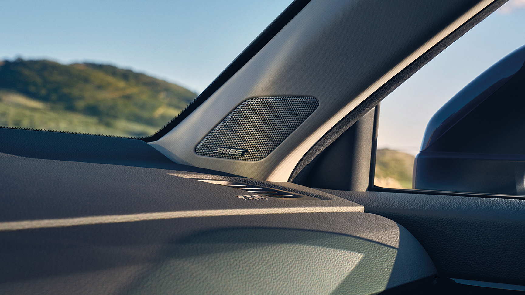 Detailný záber na reproduktory Bose vozidla Honda CR-V Hybrid.